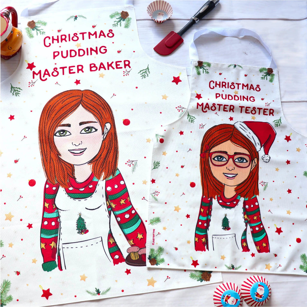 Personalised xmas aprons set for mother and daughter with a customised cartoon wearing a christmas jumper and santa hat. 