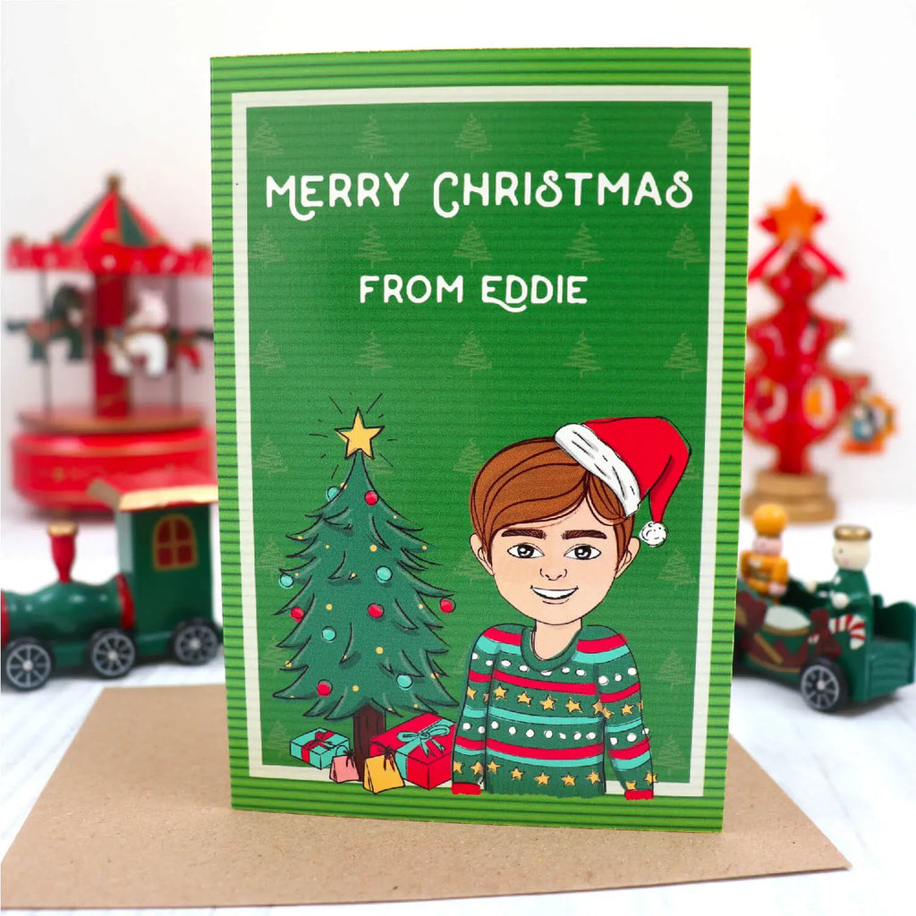 Personalised children Christmas card with customised cartoon wearing xmas jumper and santa hat with text at the top saying Merry christmas from Eddie on green pattern