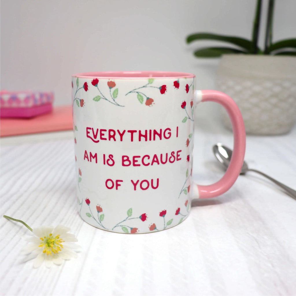 Personalised Mothers day mug with customised message on a pink floral background