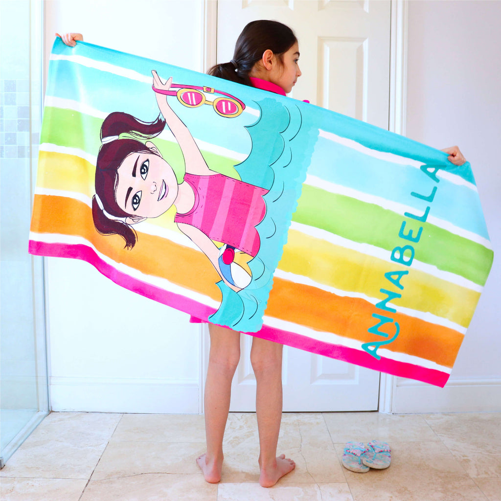 Personalised bath or beach towel with customised cartoon in rainbow pattern